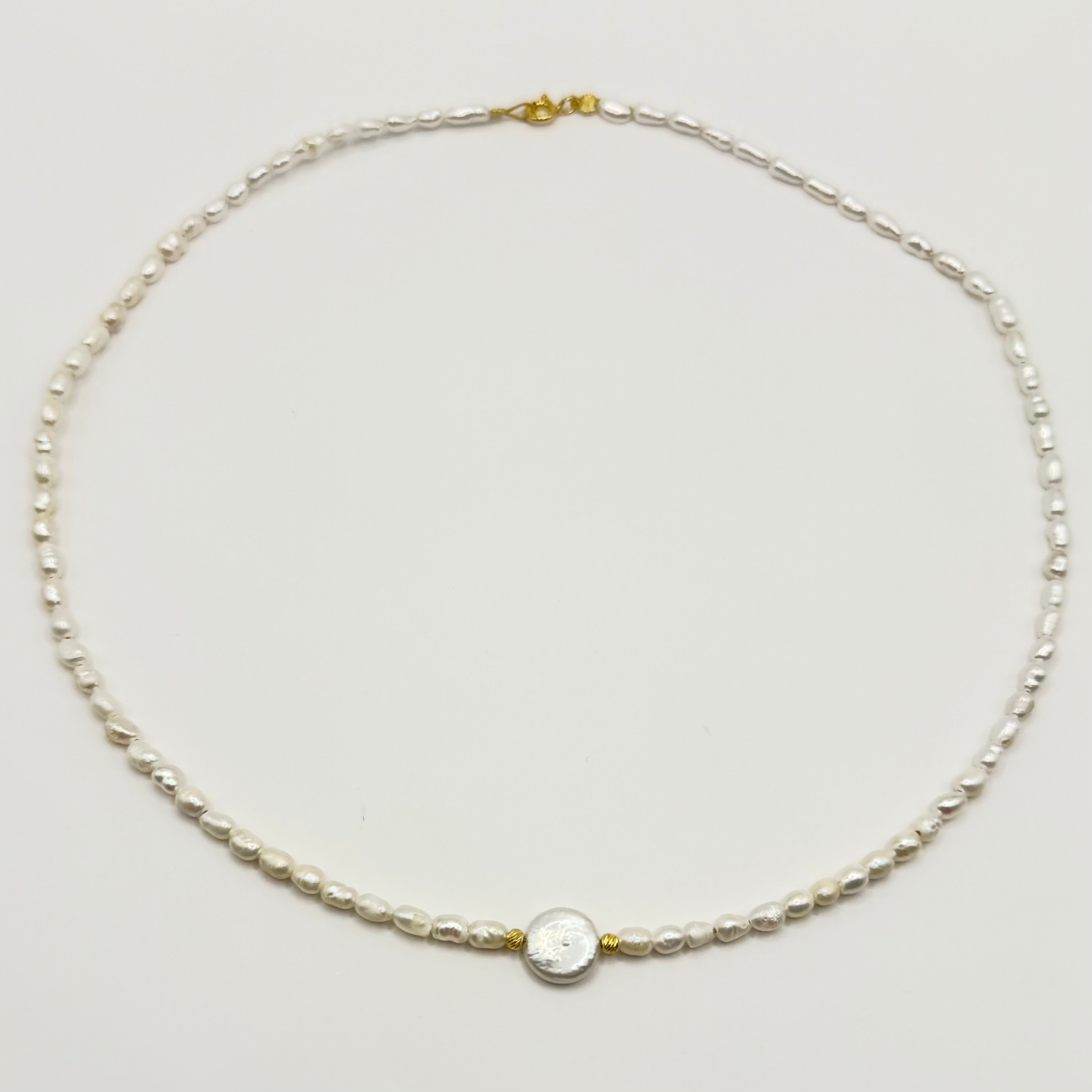Colier perle Dinuzete 123